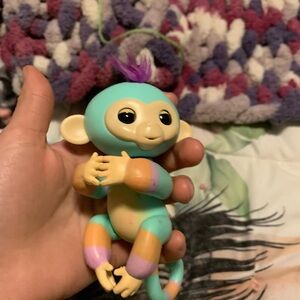 Vibrant Toy Monkey with Purple Hair